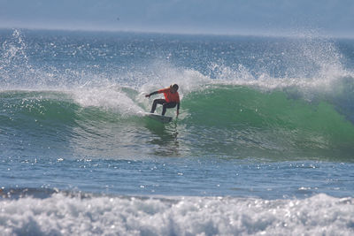 Man surfing in sea