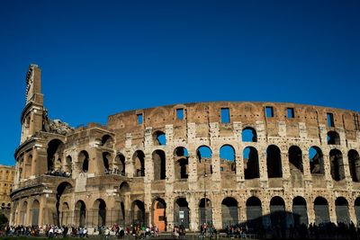 Tourists in front of coliseum