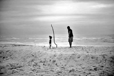 Farther and daughter at beach