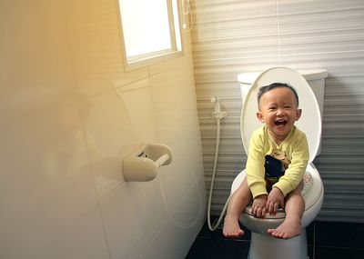 Portrait of smiling boy at home