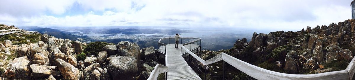 Scenic view of sea against cloudy sky