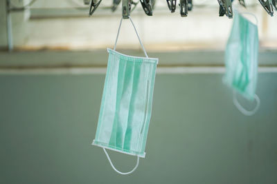 Close-up of clothespins on clothesline