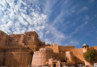 Low angle view of old building against sky