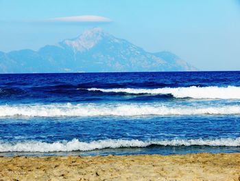 Scenic view of sea against clear blue sky