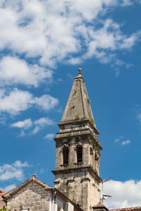 Low angle view of old building against sky