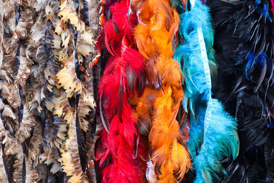 Detailed close up view on samples of cloth and fabrics in different colors found at a fabrics market
