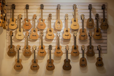 Row of clothes hanging on wall