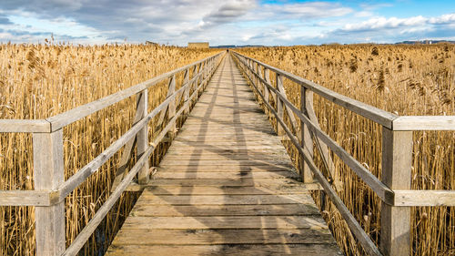 View of footbridge leading towards land