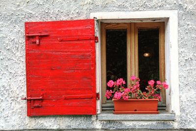 Red closed door of window