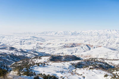 Beautiful winter panorama of the tien shan mountains in uzbekistan in the beldersay ski resort