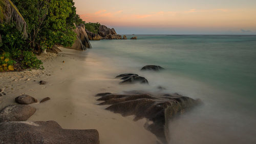 Scenic view of sea at sunset