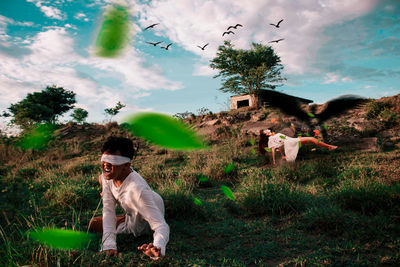 Full length of man on field against sky