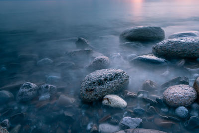 Close-up of rocks in sea