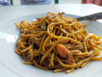 Close-up of noodles served in plate