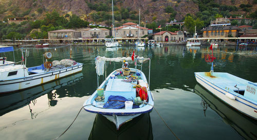 High angle view of boats moored at harbor