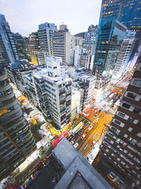 High angle view of modern buildings in city against sky