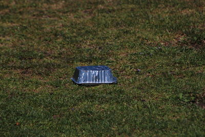 High angle view of information sign on field