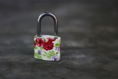 Close-up of padlock on table