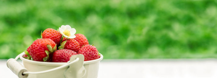 Close-up of strawberries in bowl on table