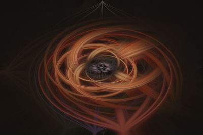 Digital composite image of light painting against black background