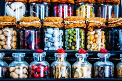 Full frame shot of food in jars for sale at store