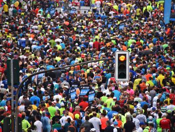 High angle view of crowd at music concert in city