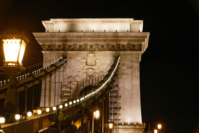 Illuminated szechenyi chain bridge at night