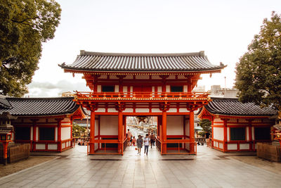 View of temple against building