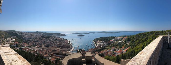 High angle view of townscape by sea