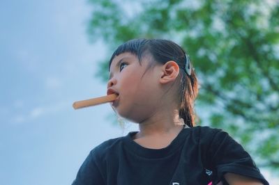 Portrait of cute girl looking away