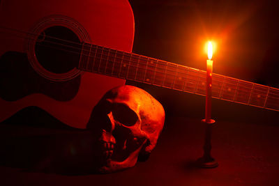 Close-up of illuminated guitar