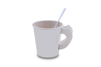 Close-up of coffee cup against white background