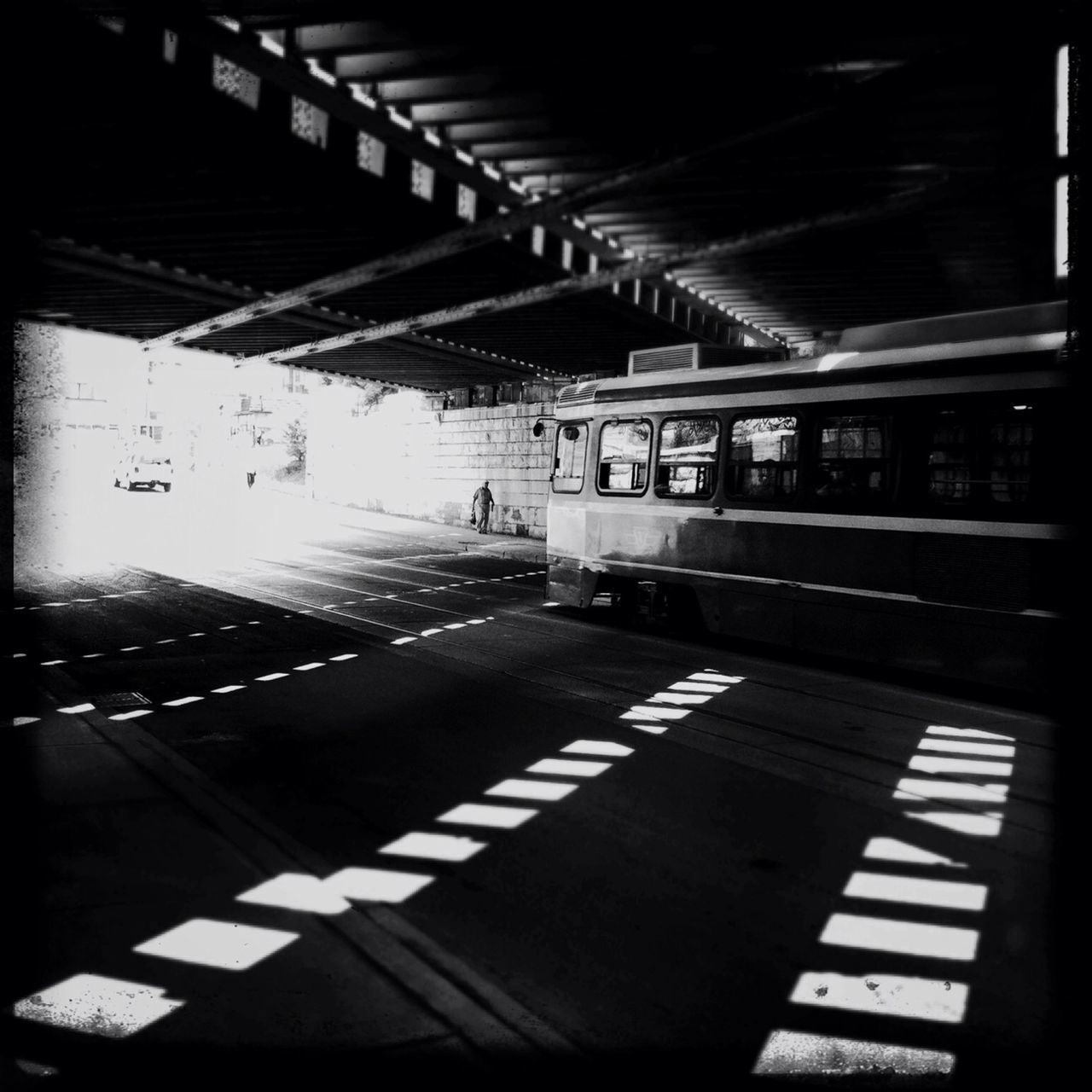 indoors, empty, illuminated, architecture, built structure, ceiling, the way forward, absence, flooring, tiled floor, corridor, architectural column, text, diminishing perspective, subway station, sunlight, in a row, no people, subway, lighting equipment