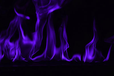 Close-up of fire against black background