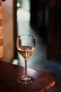 Close-up of wineglass on table