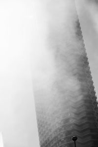 Low angle view of building against cloudy sky