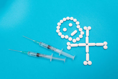 High angle view of information sign on blue background