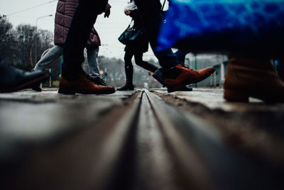 Low section of people on railroad track