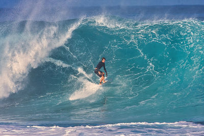 Man surfing in sea