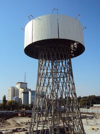 Low angle view of water tower against sky