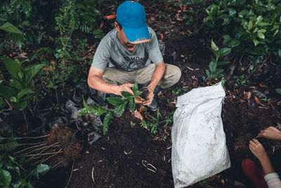 High angle view of man working on field