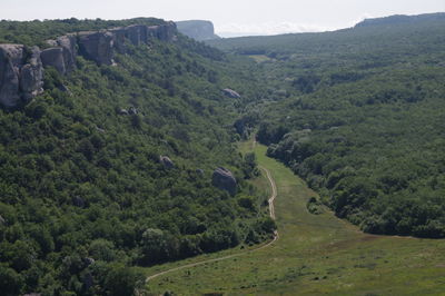 Scenic view of green landscape and mountains