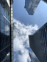 Low angle view of modern buildings against sky