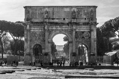 Group of people in front of historical building