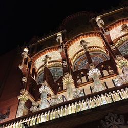 Low angle view of illuminated statue at night