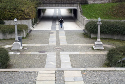 High angle view of people walking on footpath