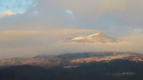 Scenic view of mountains against sky during sunset