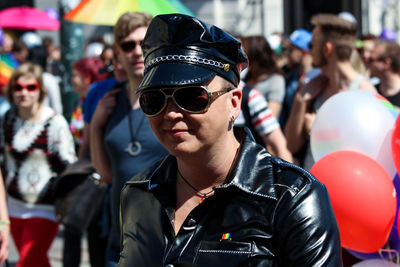 Portrait of man and woman wearing sunglasses