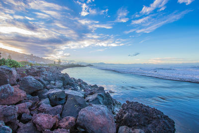 Scenic view of sea against sky during sunset