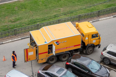 High angle view of vehicles on road in city